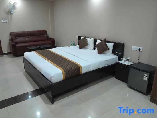 Бангалор: The Nisarga Grand Boarding & lodging