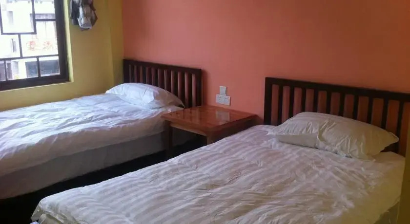 Синъи: Xing Yi International Hostel