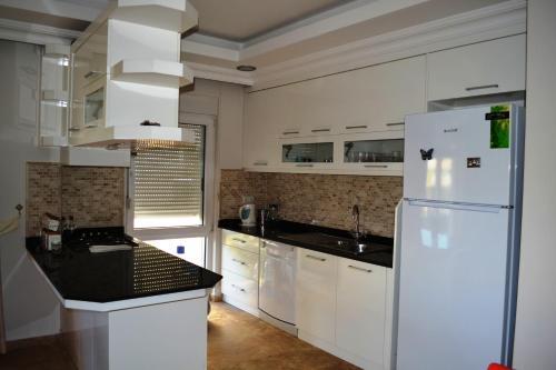 Белек: Antalya belek odyssey park ground floor 2 bedrooms pool view close to center