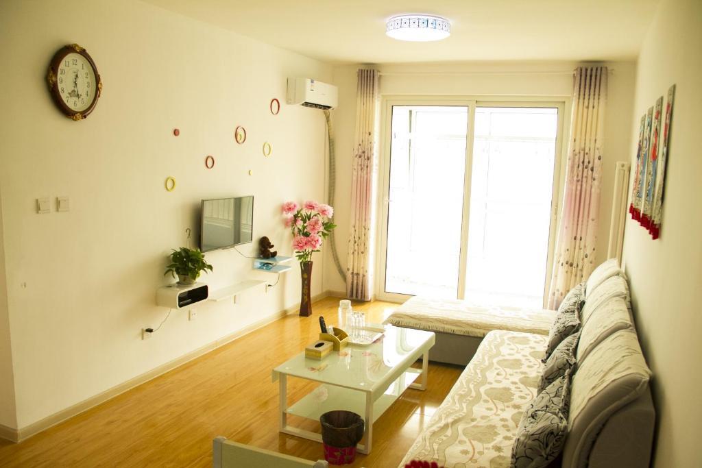 Циндао: Jinshatan Qingdao Huaxia Theseas Apartment