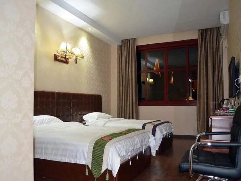 Цзинхун: Xishuangbanna Shuidai Inn