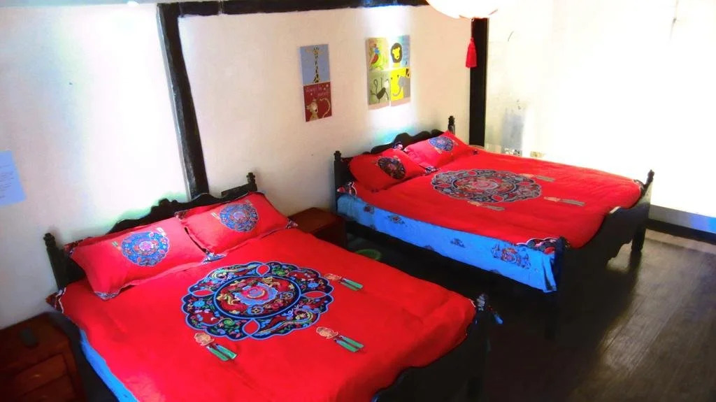 Лицзян: Xiaojudeng Hostel Menghui Tangchao