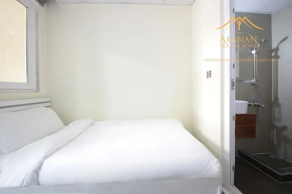 Дубай: New Arabian Holiday Homes Jvc Villa
