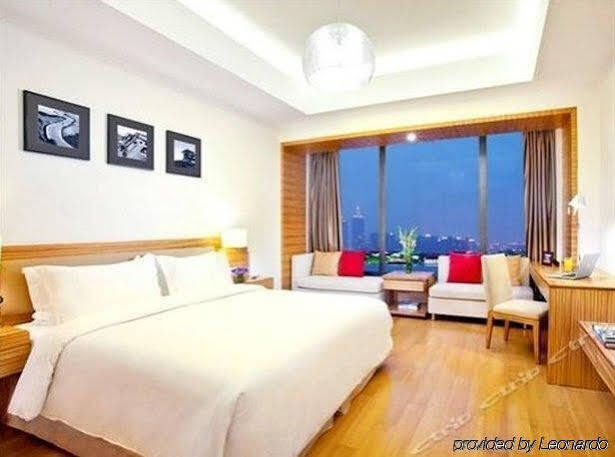 Сучжоу: Suisse Place Li Gong Ti Apartment Hotel
