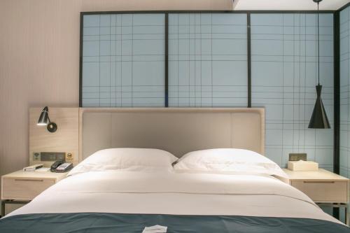 Янгиианг: Echarm Hotel Yangjiang Baili Plaza Branch