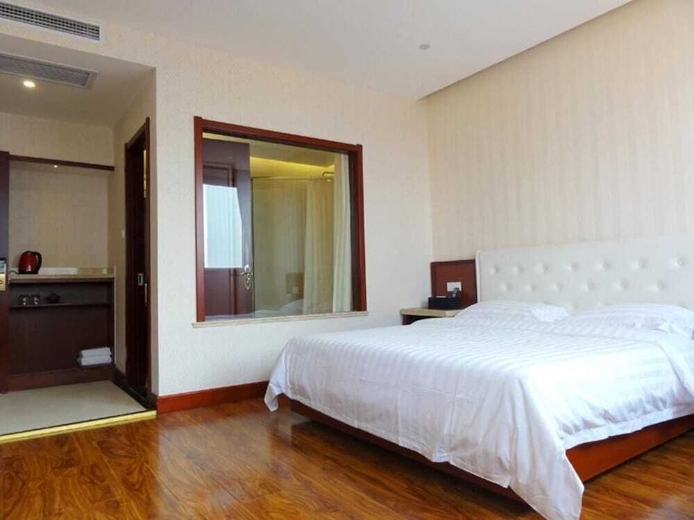 Циндао: Qingdao Hua Qi Kai Di Hotel