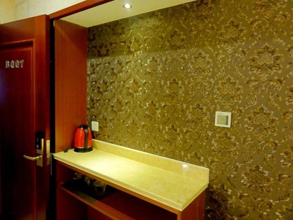 Циндао: Qingdao Hua Qi Kai Di Hotel