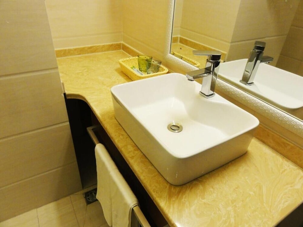 Циндао: Qingdao Hua Qi Kai Di Hotel