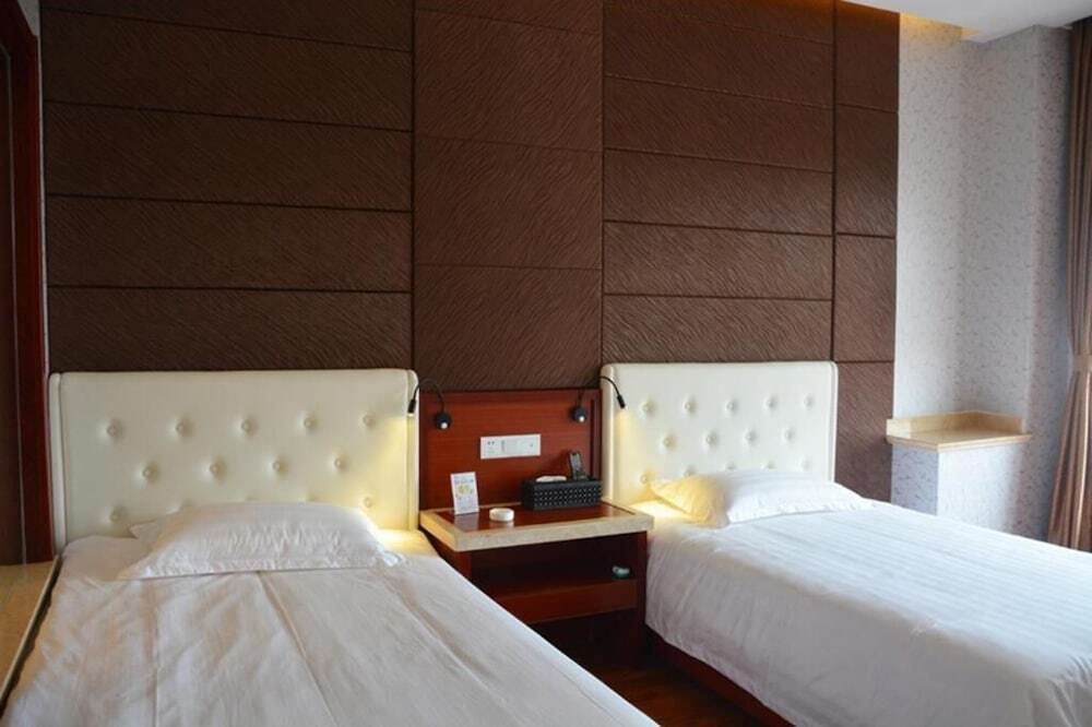 Циндао: Qingdao Hua Qi Kai Di Hotel