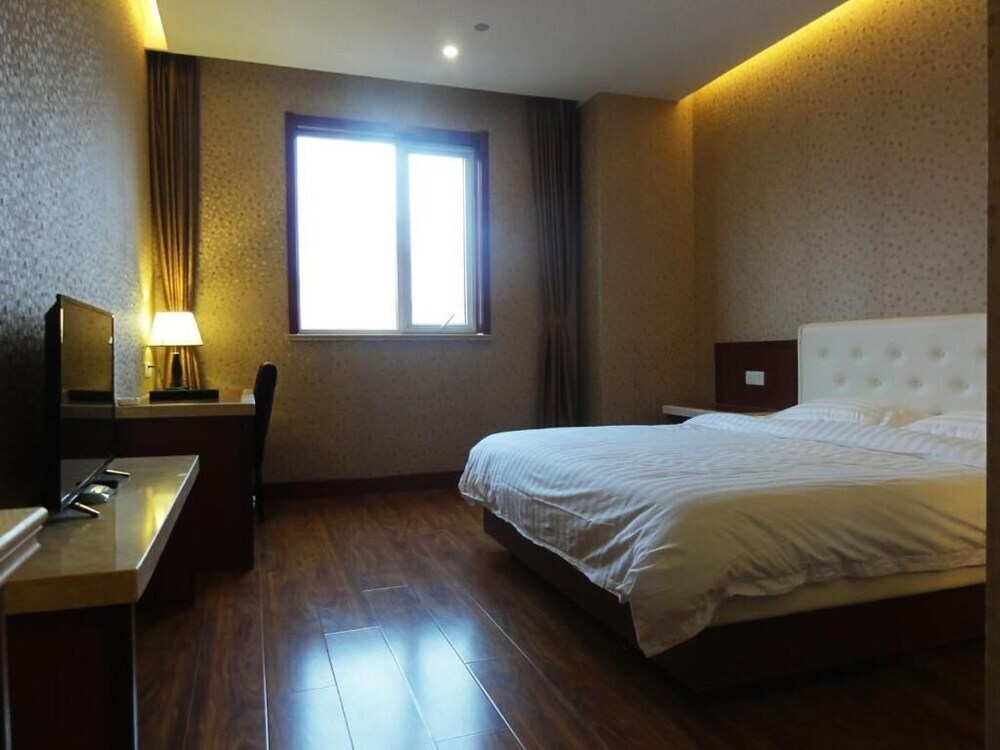 Циндао: Qingdao Hua Qi Kai Di Hotel