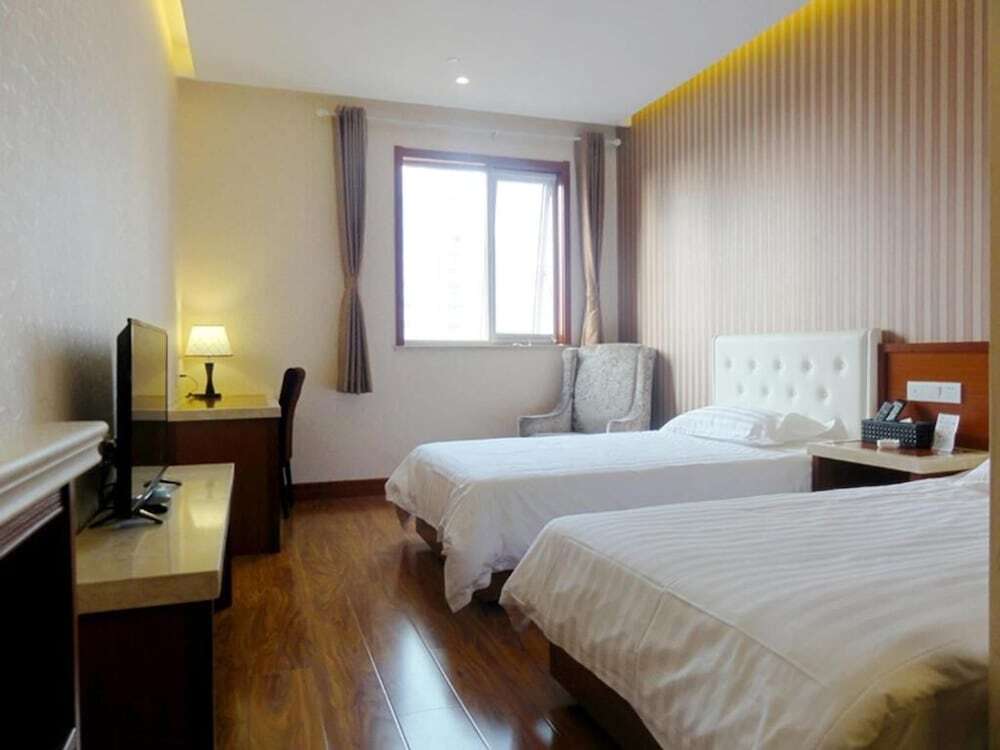 Циндао: Qingdao Hua Qi Kai Di Hotel