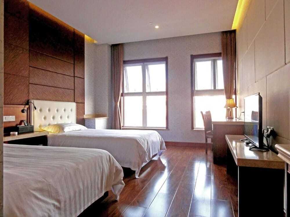 Циндао: Qingdao Hua Qi Kai Di Hotel