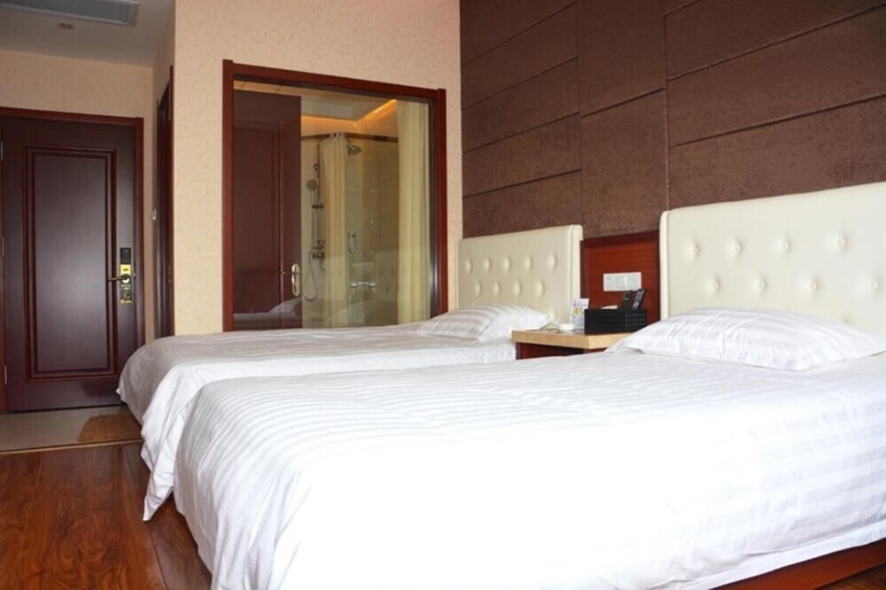 Циндао: Qingdao Hua Qi Kai Di Hotel