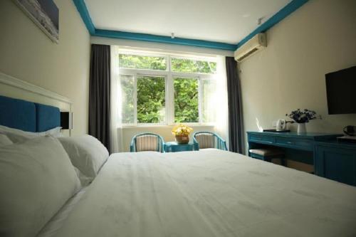 Наньнин: Hy Xman Hotel Xin Zhu Road Branch
