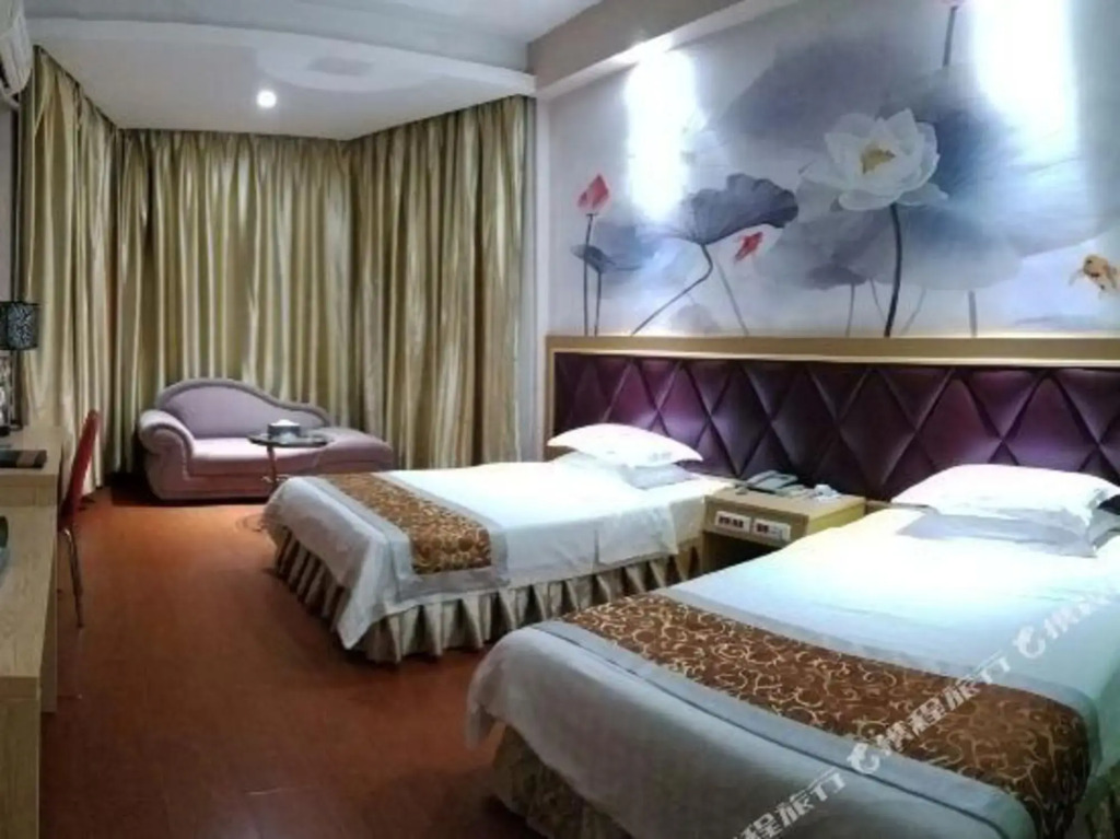 Хэчи: Ganglong Business Hotel