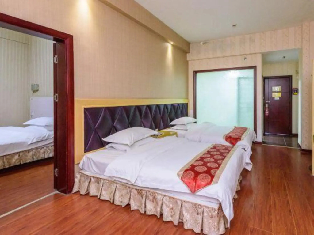 Хэчи: Ganglong Business Hotel