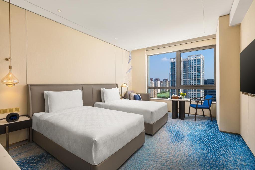 Шанхай: Hualuxe Shanghai Changfeng Park, an IHG Hotel