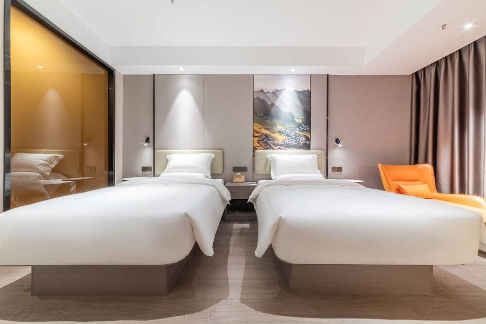 Лупаньшуй: Qin Yue Shi Ye Hotel