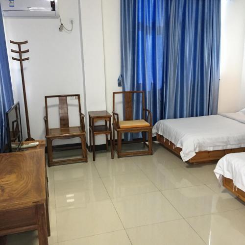 Джиангме: Sheng Hai Business Hotel