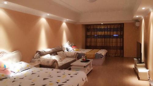 Qiqihar Wanda Golden Coast Apartment — фото 3