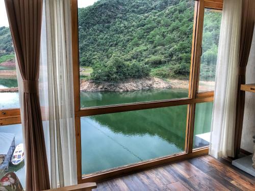 Ханчжоу: Deyishe Warm Night Lakeview Homestay