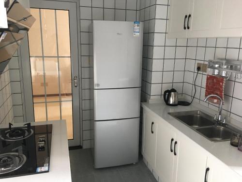 Чунцин: Jiefangbei Baobao Yueyue Apartment