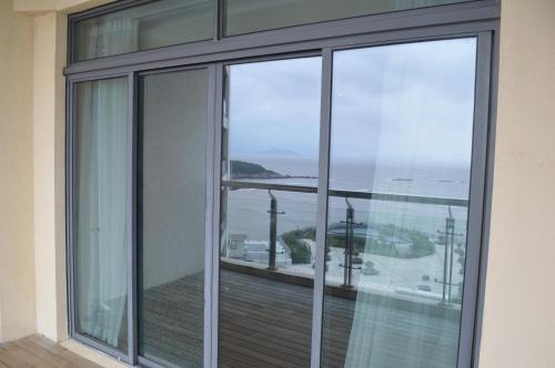 Чжоушань: Lao Cuo Zhai Ren Apartment