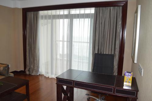 Чжоушань: Lao Cuo Zhai Ren Apartment