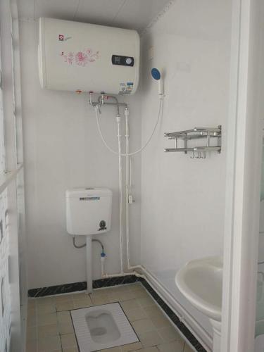 Паниин: Honghaitan Chunlin Guesthouse