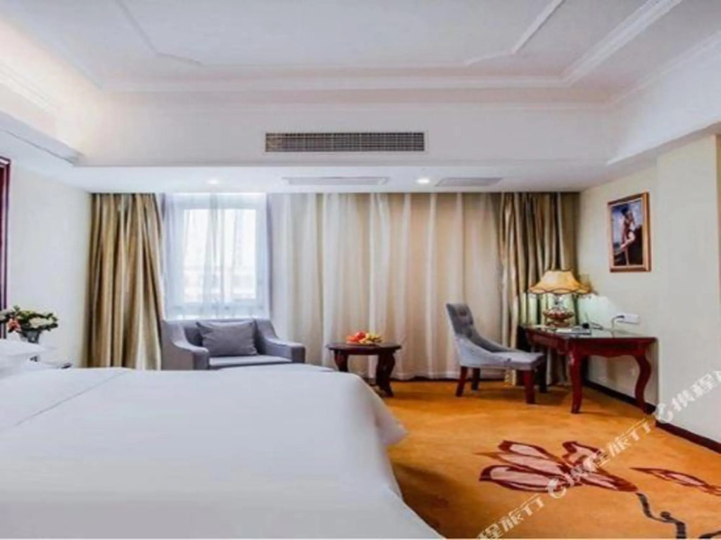 Тайчжоу: Vienna International Hotel (Taixing Huangqiao Jiayuan Plaza)