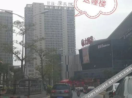 Xinyueju Boutique Apartment (Shishi Clothing City Shimao Skyscraper City Branch) — фото 4