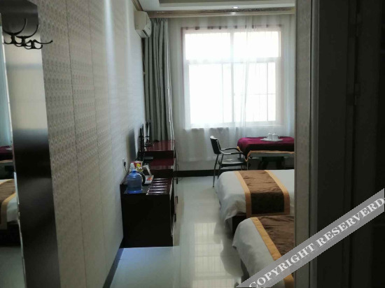 Сяньян: Xunyi cinema business hotel