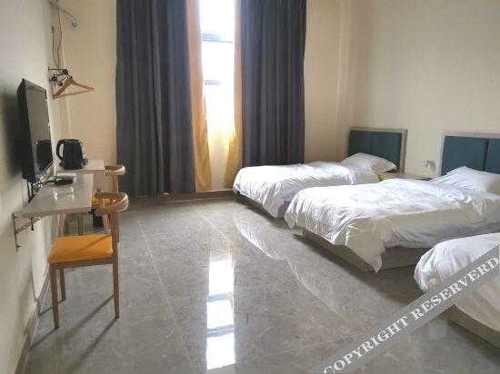 Янгиианг: Xiya Hotel