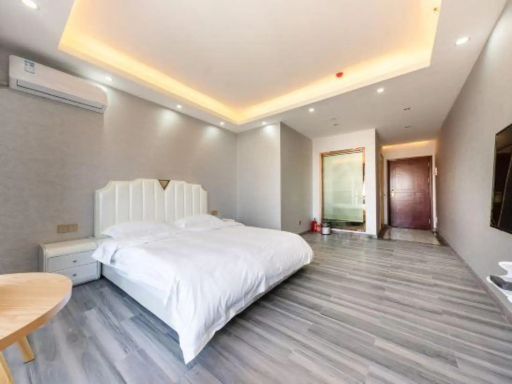 Чжуншань: Smiley Hotel apartment (Nakhon long central store, Zhongshan) ,