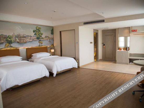 Байан-Нур: Vienna Hotel (Wuyuan Moore City store)