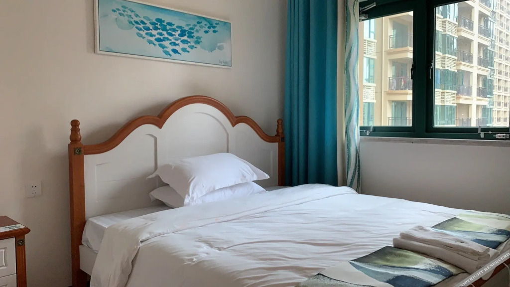 Янгиианг: Yangjiang Hailing Island Chunnuan Huakai Apartment
