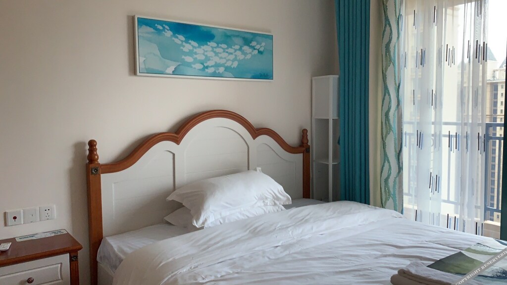 Янгиианг: Yangjiang Hailing Island Chunnuan Huakai Apartment