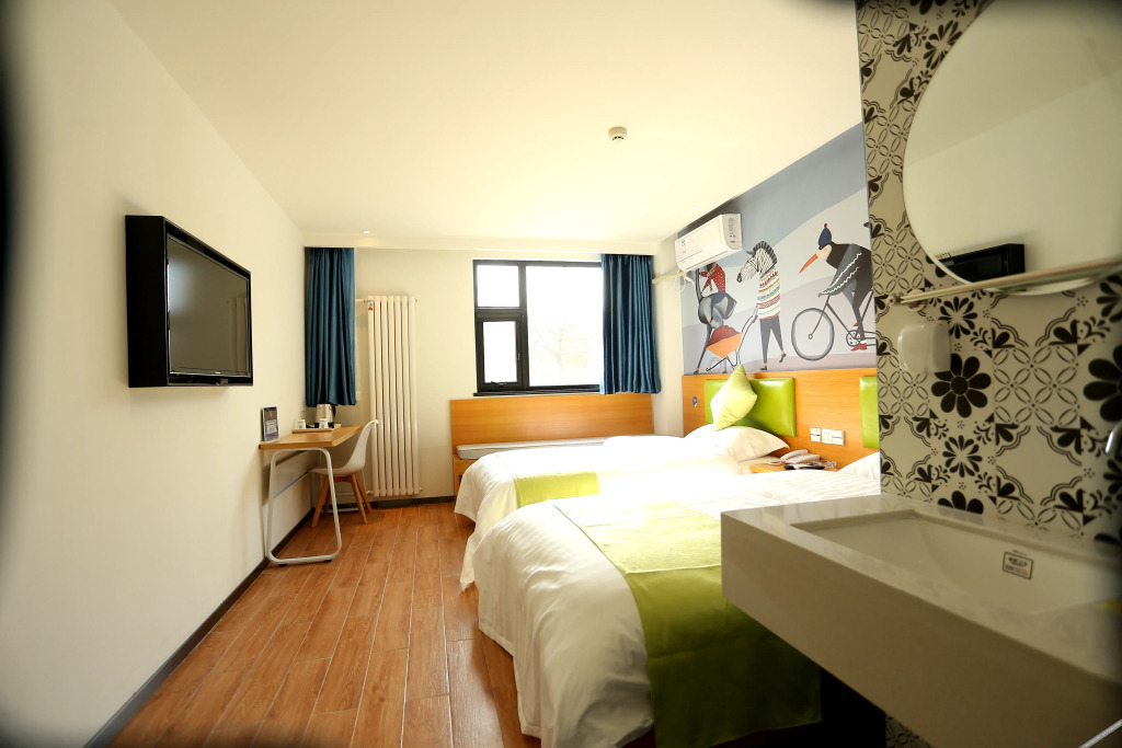 Лянфан: 99 Xinbiao Hotel(Langfang Teachers College Store)
