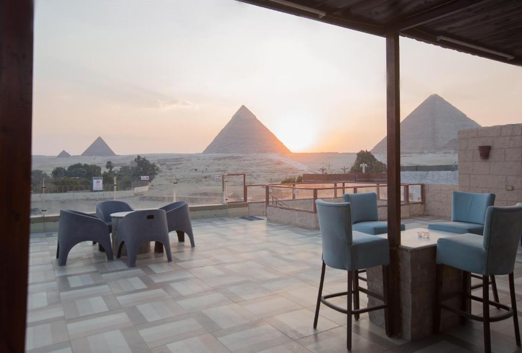 Гиза: Cairo Pyramids View