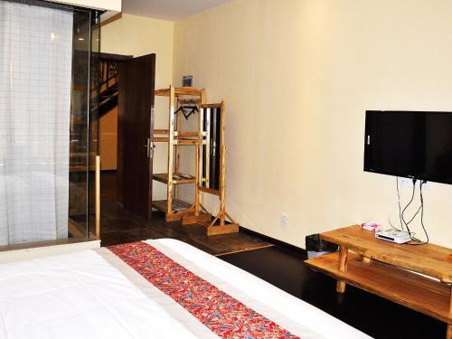 Цзюцюань: Dunhuang Jinshed Times Yododo Inn