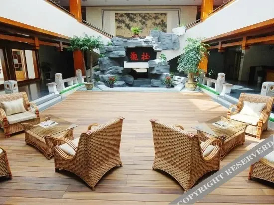 Цзинин: Taibai Restaurant Boutique Garden Hotel (Jining North Bus Station Vocational and Technical College)