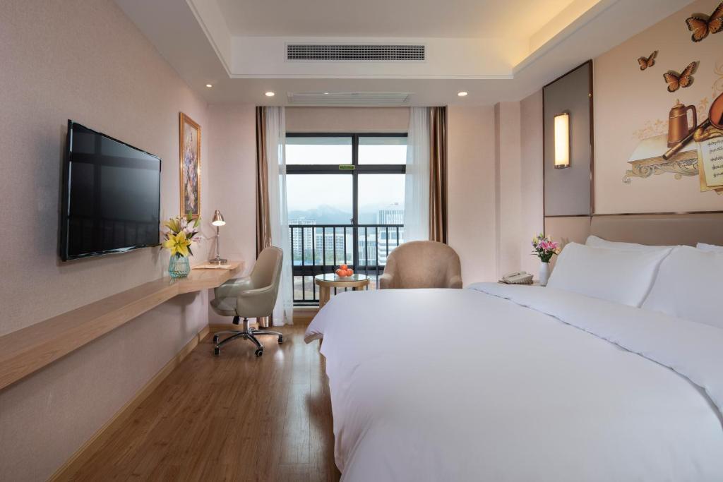 Наньнин: Vienna Hotel Nanning Xiangsi Lake University Town Branch