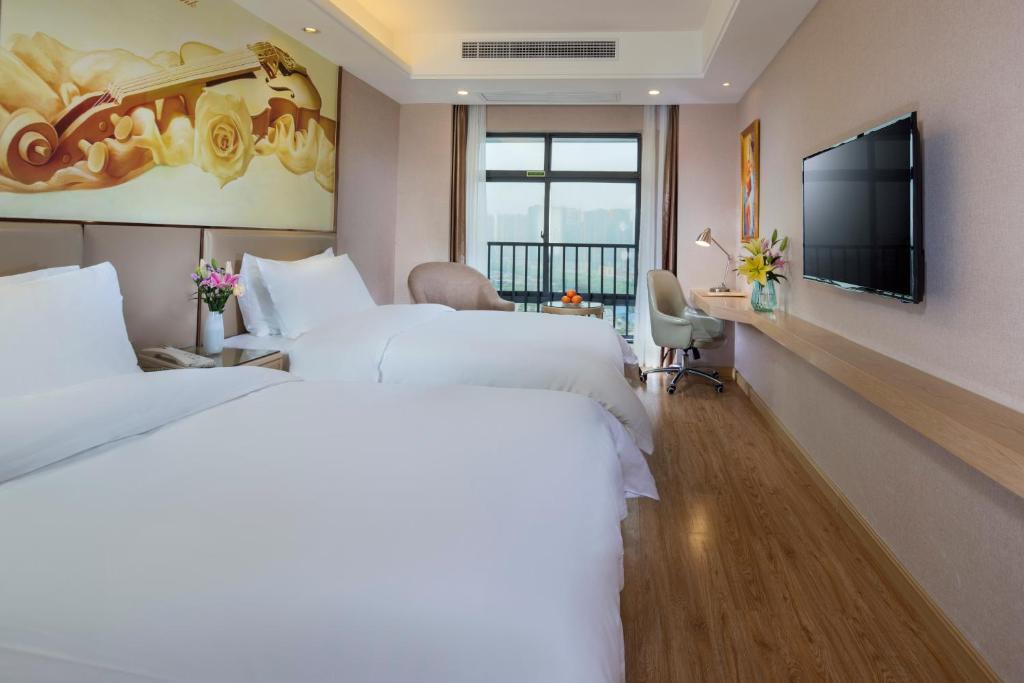 Наньнин: Vienna Hotel Nanning Xiangsi Lake University Town Branch