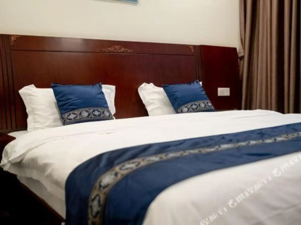 Наньнин: Dong Men Business Hotel
