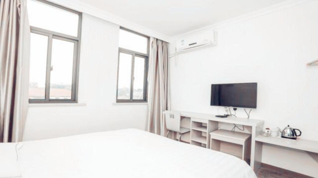 Фучжоу: Zhangle Tangang Fanxing Aparthotel