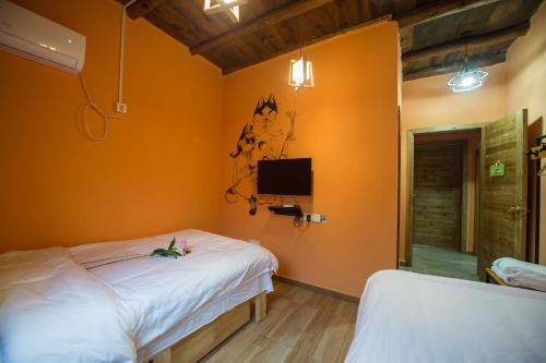 Ичунь: Shuikoujiushe Guest House