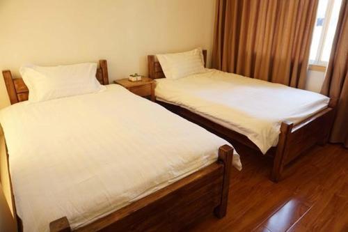 Синъи: Xingyi Wanfeng Lin Jianshan Guest House