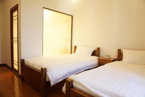 Синъи: Xingyi Wanfeng Lin Jianshan Guest House