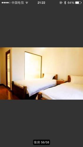 Синъи: Xingyi Wanfeng Lin Jianshan Guest House