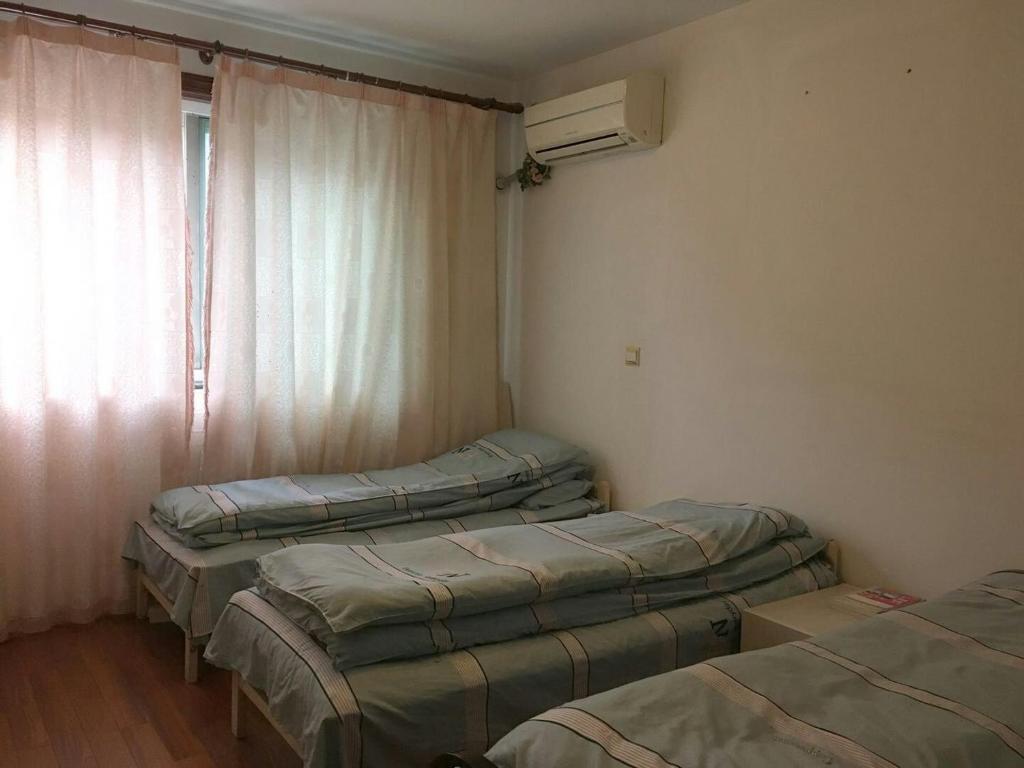 Шанхай: Pusuweilan Hostel